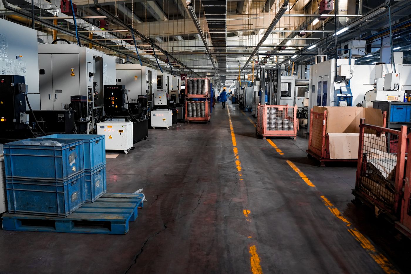 A manufacturing hall lined with CNC machining centres